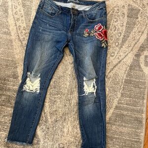 Embroidered jeans, distressed